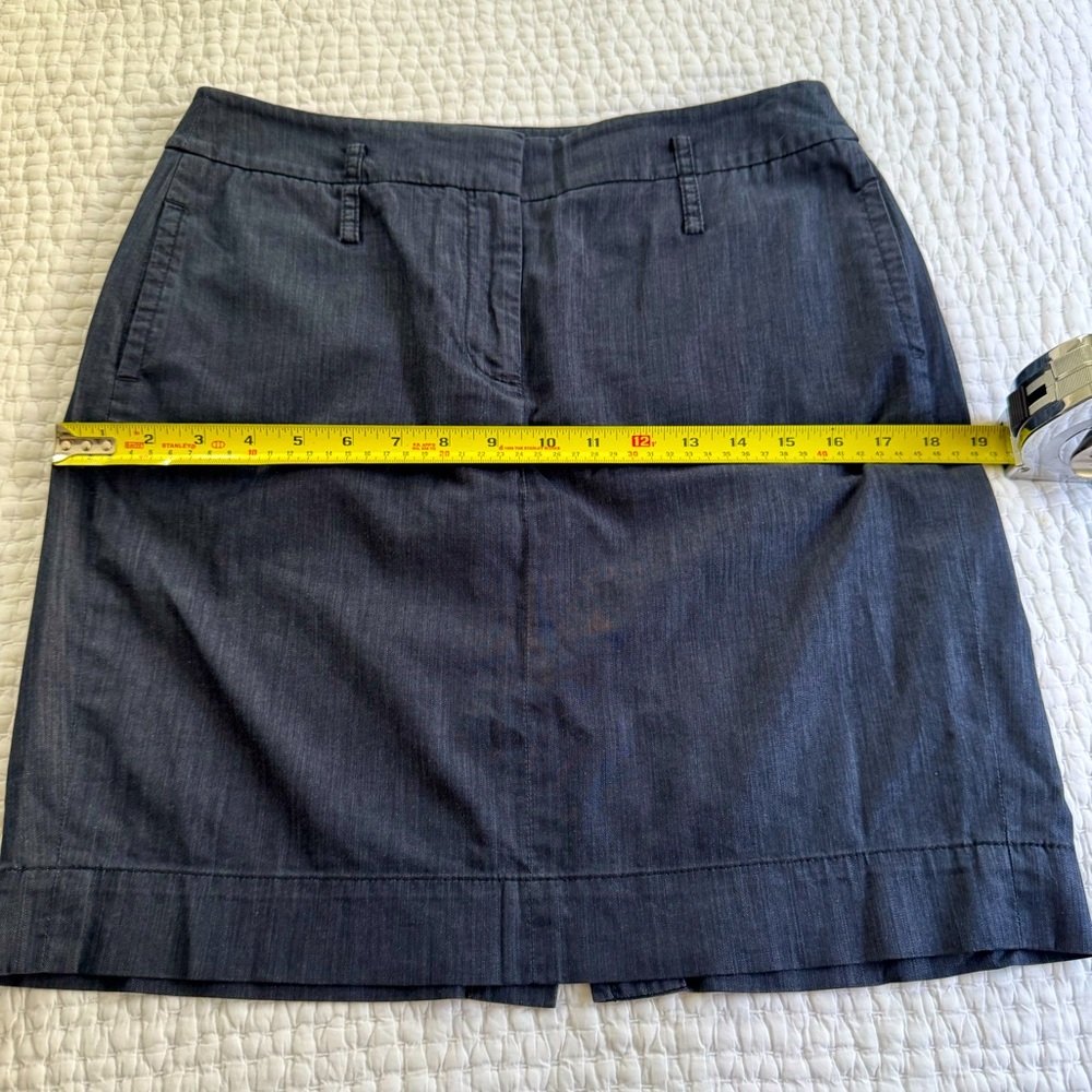 Ann Taylor Loft denim blue cotton skirt with pockets. 19’ long.